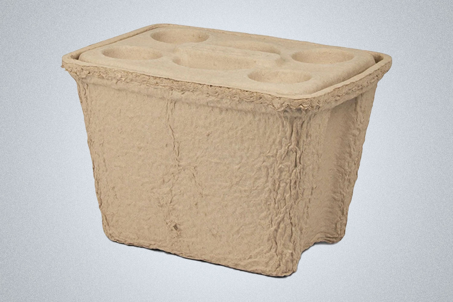a compostable biege cooler from IGLOO  on a grey background 