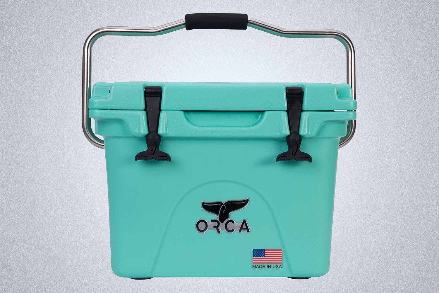 a sea blue-green Orca cooler  on a grey background 