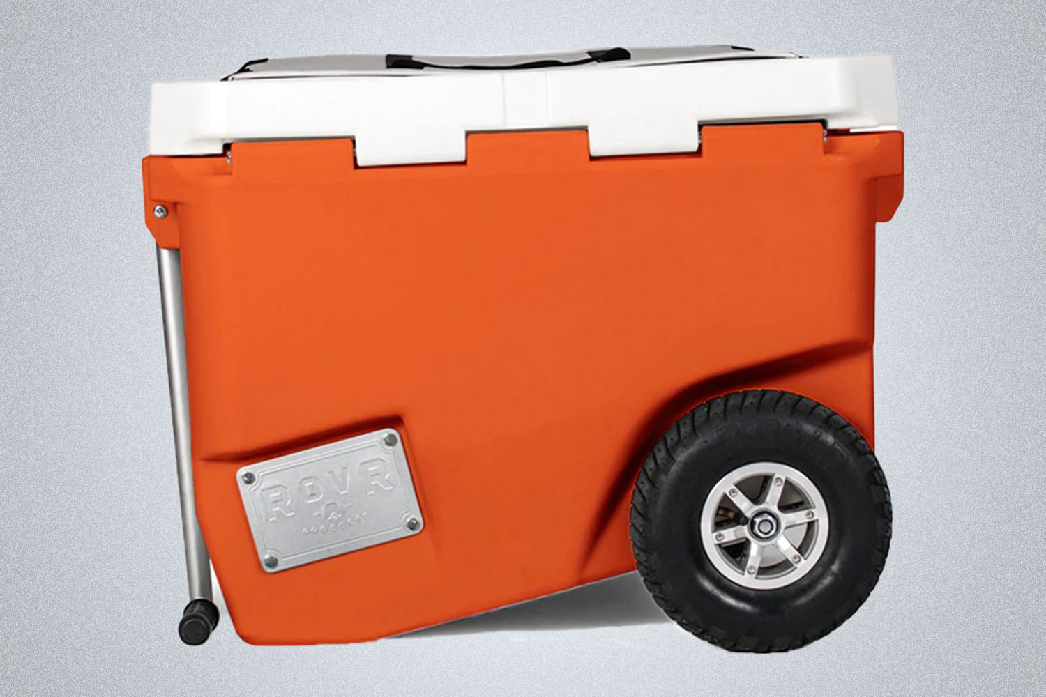 an orange RovR cooler with a handle and wheels  on a grey background 