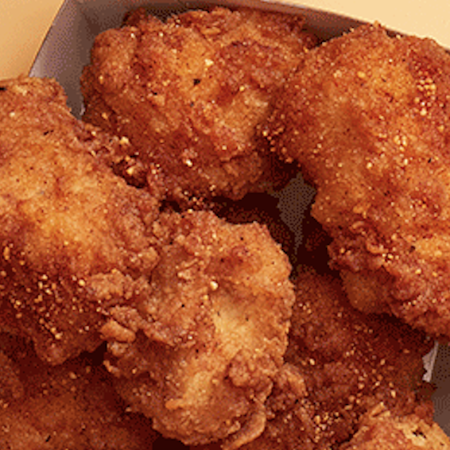 Chicken bites dusted in hot honey seasoning