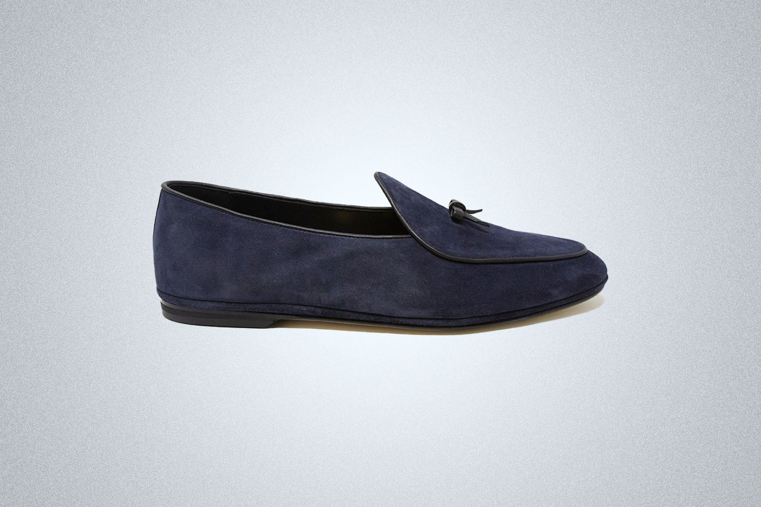 A pair of Summer Loafers from Todd Snyder on a grey background