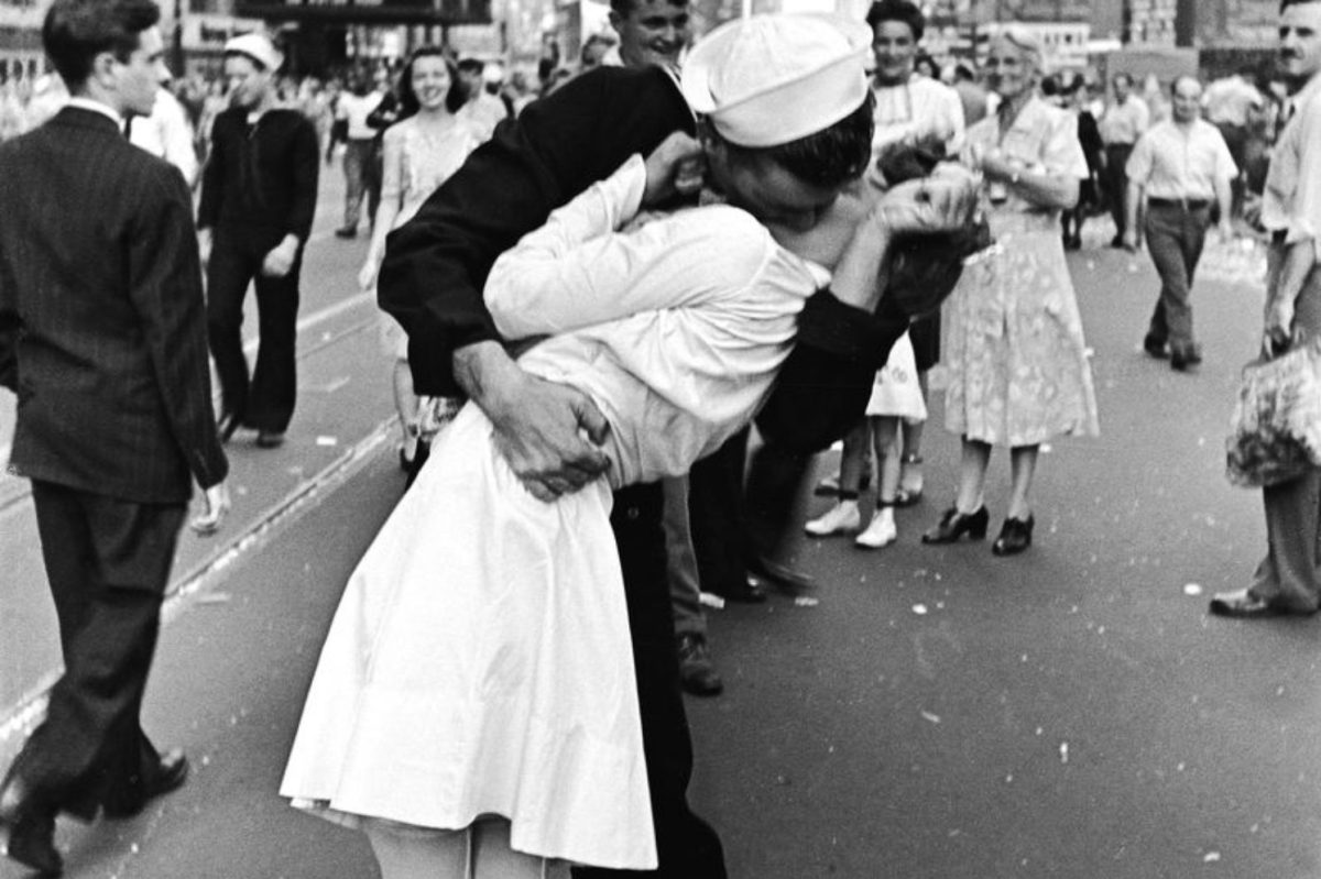 Alfred Eisenstaedt's iconic "VJ Day in Times Square" shows a WWII soldier kissing a nurse.