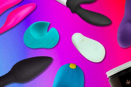Various waterproof sex toys and vibrators on a purple background