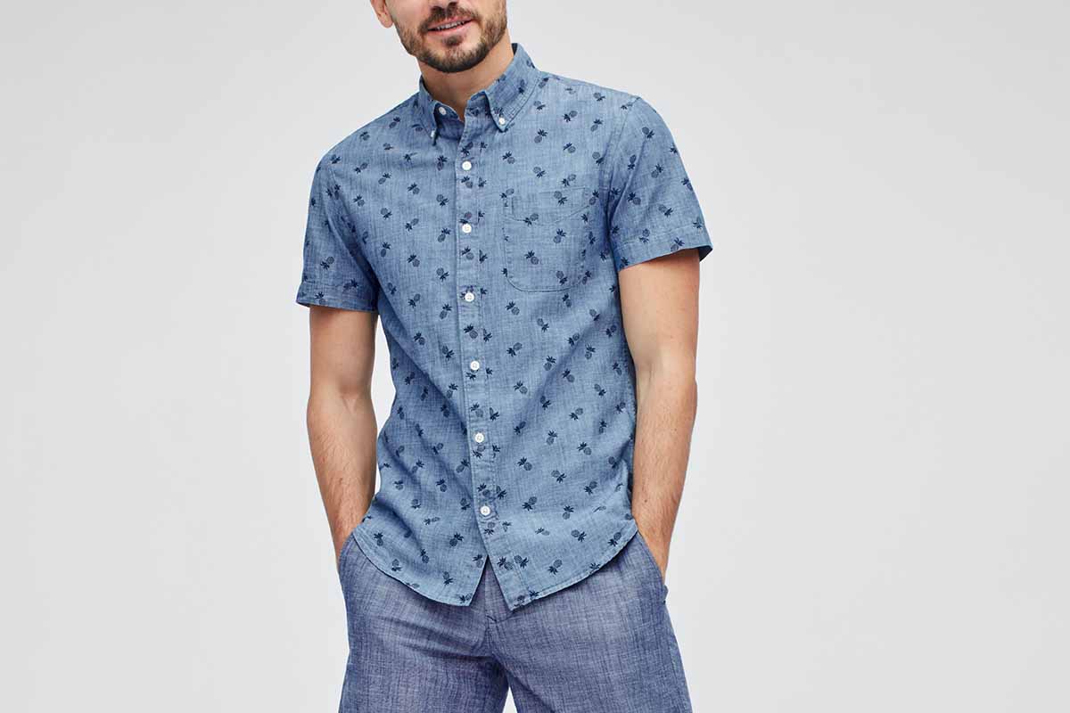 a man wearing a blue Bonobos Riviera short sleeve shirt, which is now on sale