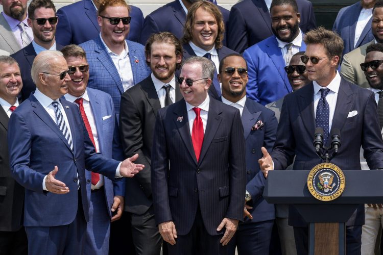 Tom Brady makes jokes with President Joe Biden as the Tampa Bay Buccaneers visit the White House after their Super Bowl win