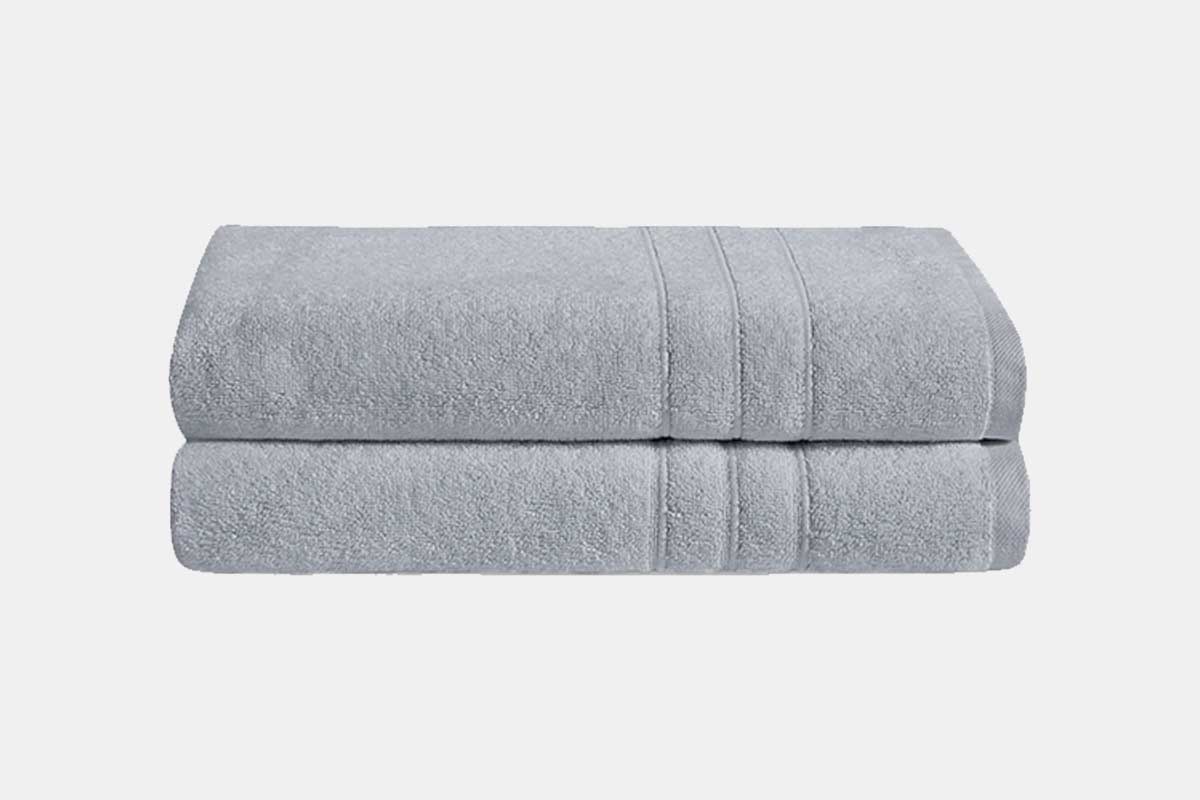 Two Plush Bath Towels from Brooklinen in a grey smoke color. The towels are on sale at Bespoke Post.