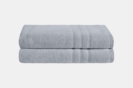 Two Plush Bath Towels from Brooklinen in a grey smoke color. The towels are on sale at Bespoke Post.