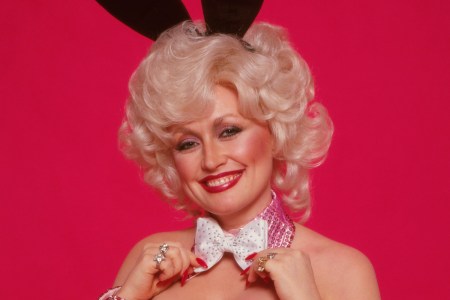 Dolly Parton poses for Playboy in a bunny suit, ears and bow tie