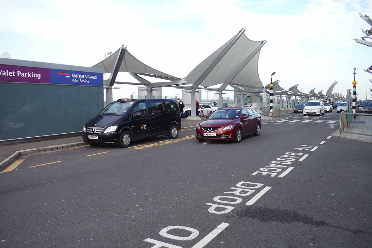 A drop off and a pick up point at Heathrow's Terminal 5. Drop-offs will now cost an extra fee.