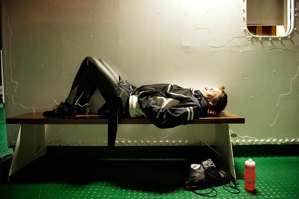 A triathlete in Norway sleeping on a bench. Do elite athletes like him need more or less sleep than the rest of us?