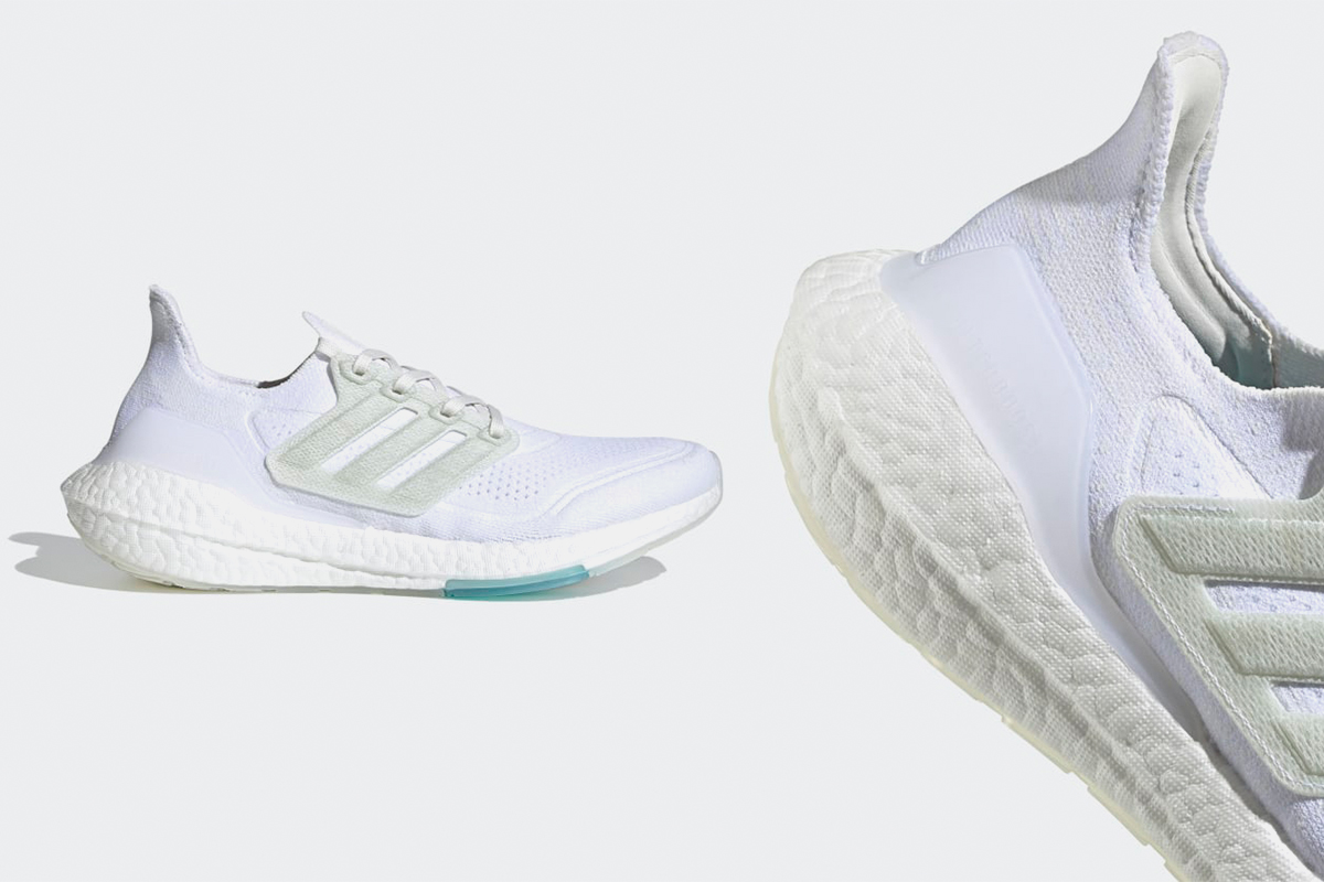 Adidas ultraboost 21 sneakers in Cloud White. The men's running shoes are currently on sale almost 50% off.