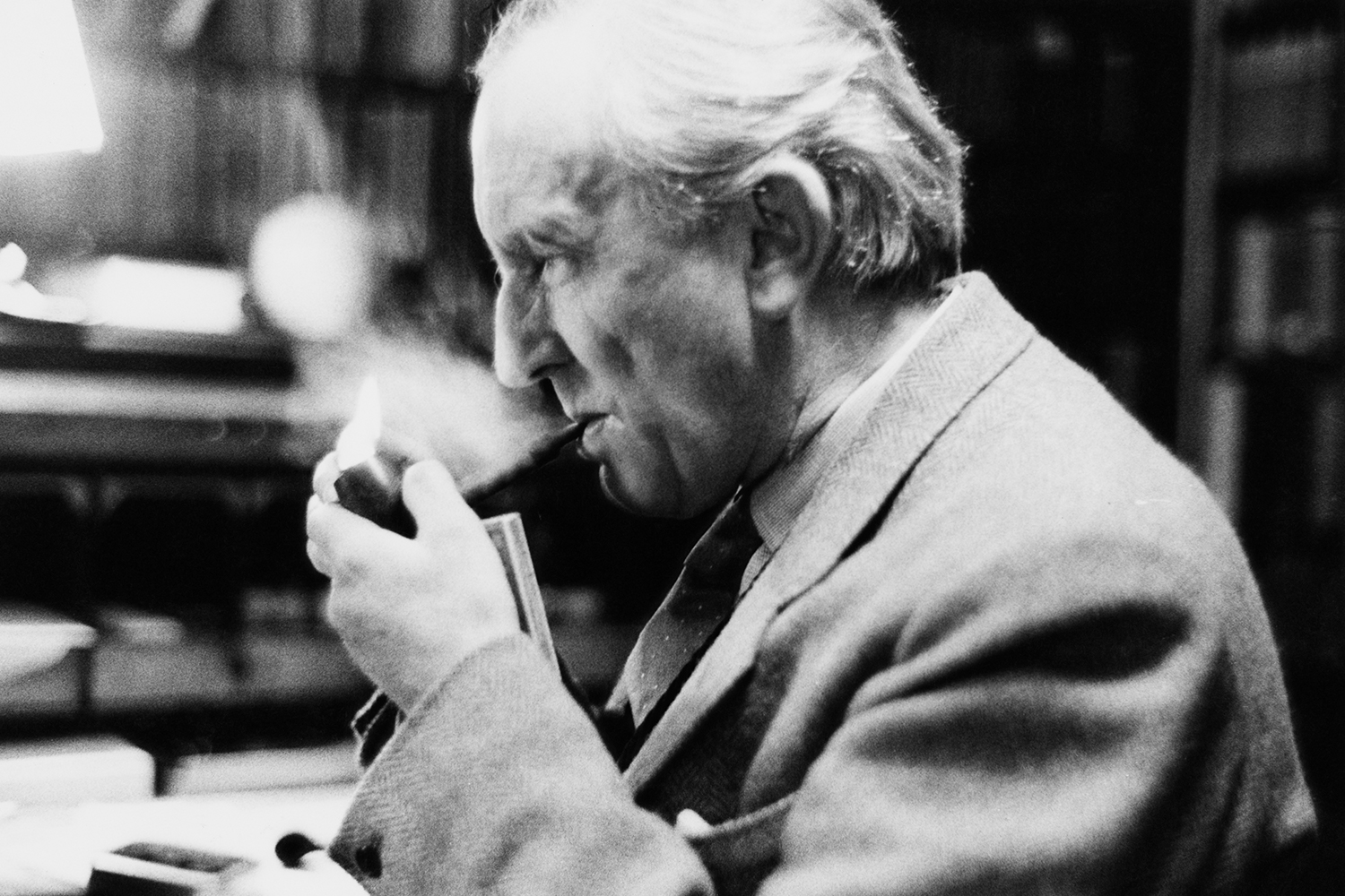 J.R.R. Tolkien smoking a pipe at Oxford in December 1955, a couple years after he completed his translation of "Sir Gawain and the Green Knight."