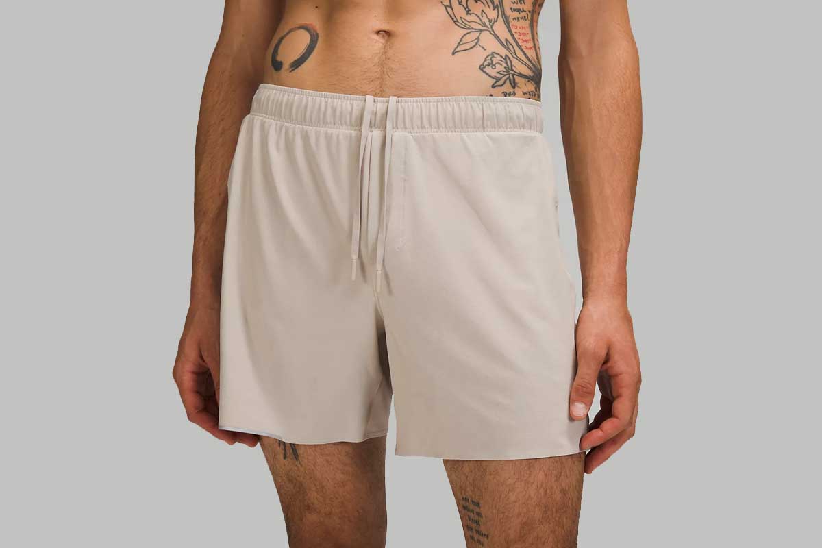 A model wearing Lululemon's Surge Short 6" Liner running shorts