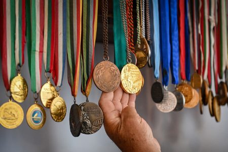 A showcase of Olympic medals. Athletes in the Tokyo Olympic Games will be putting on their own medals due to the on-going Covid-19 pandemic.