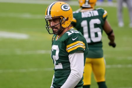 Aaron Rodgers warming up