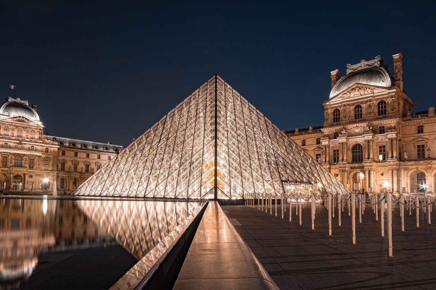 the louvre lit up at night