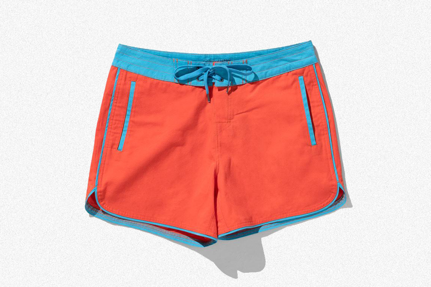 Organic Throwback Board Shorts from United by Blue in coral and blue 