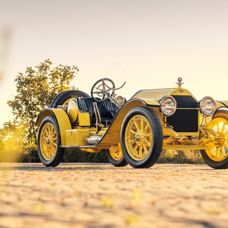 A yellow and black 1914 Stutz 4E Bearcat, a Brass Era sports car heading to auction at Pebble Beach via Gooding & Company