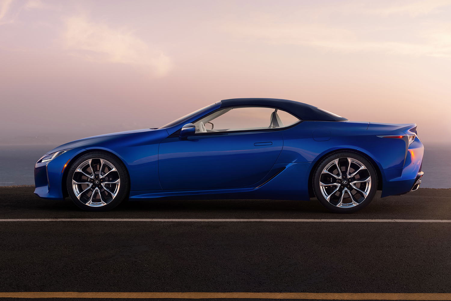 The profile of the 2021 Lexus LC 500 Convertible with the top up. We reviewed the grand tourer and came away loving it.