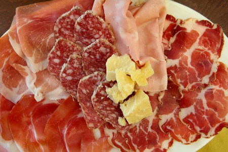 A platter of regional specialties of Prosciutto di Parma, salami, Culatello and Parmesan cheese is served at Antica Salumeria Giorgio Pancaldi, a delicatessen which traces its history back to the 15th century, on March 24, 2017 in Reggio Emilia, Italy. The CDC recommends heating all similar Italian meats in the US due to two salmonella outbreaks.