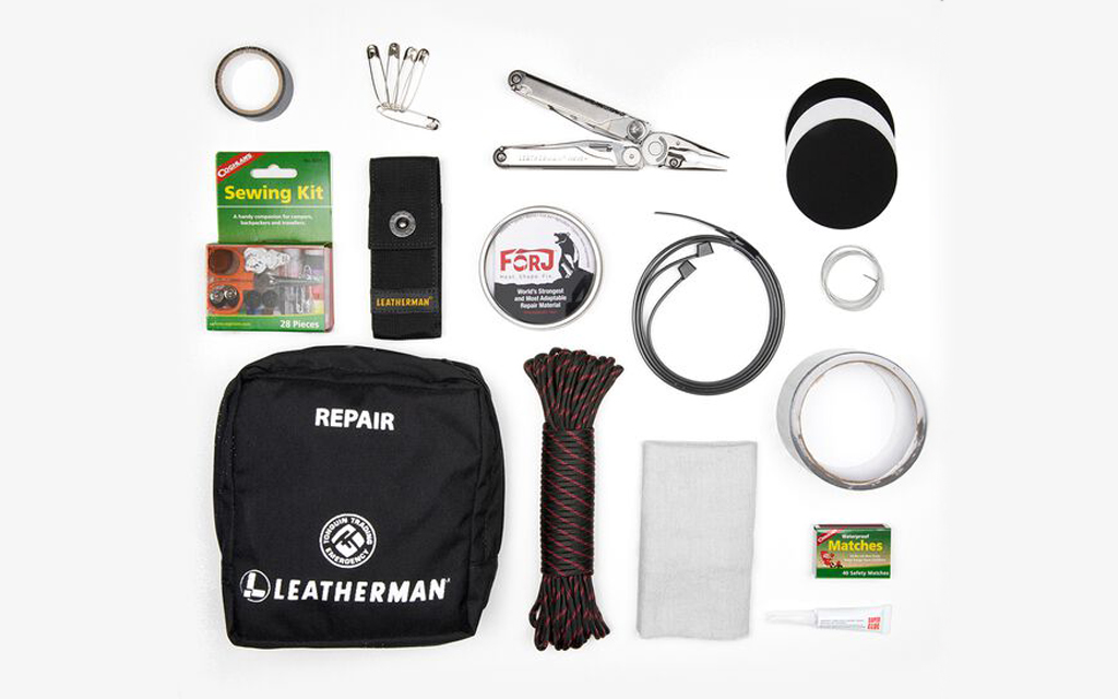 All the tools and gear in the Leatherman Wave+ Repair Kit, including the multitool as well as paracord, matches, a sewing kit and more.