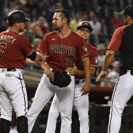 Caleb Smith reacts after having his glove confiscated. The Arizona Diamondbacks pitcher became the second MLB player ejected for sticky substances on August 18, 2021.