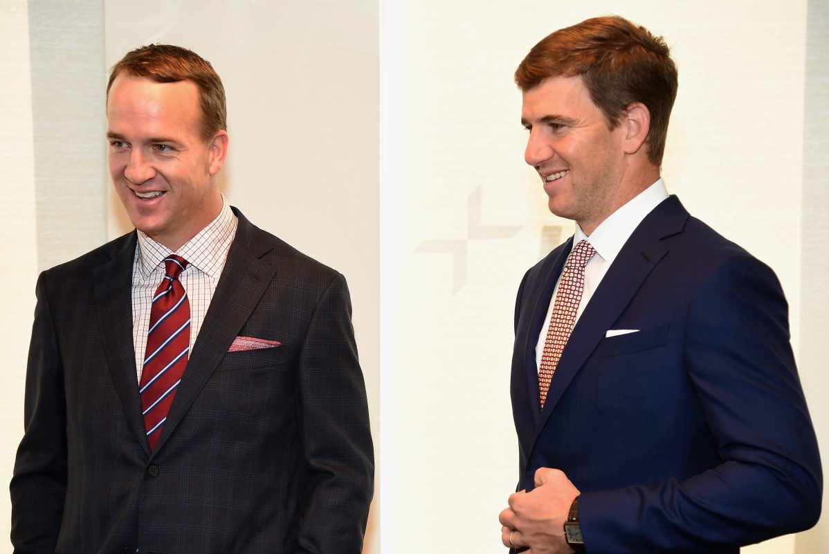 Peyton Manning and Eli Manning attend a charity event. The brothers will host several ESPN football broadcasts without a traditional host.