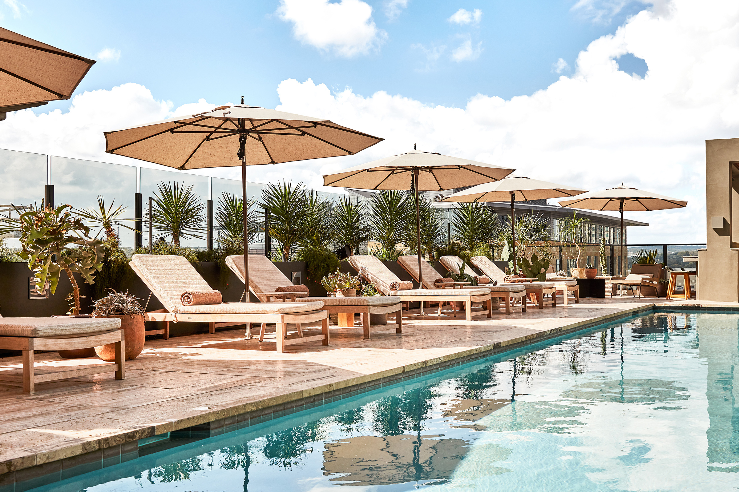 the rooftop pool at la piscina at the austin proper hotel