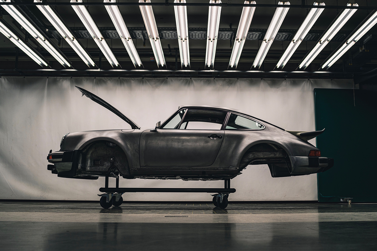 A Porsche sports car undergoing factory restoration. As of 2021, the automaker is offering more customization and personalization options than ever.