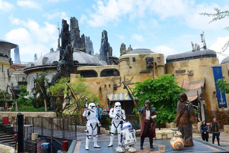 Star Wars characters R2-D2, Hondo Ohnaka, BB-2 and Chewbacca perform during the Star Wars: Galaxy's Edge Dedication Ceremony at Disney’s Hollywood Studios on August 28, 2019 in Orlando, Florida. A newer Star Wars immersive adventure is starting up in 2022.