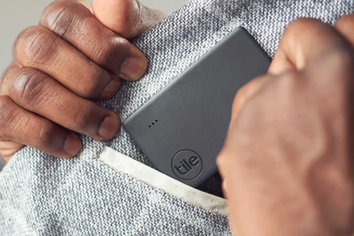 A close-up of the Tile Slim in a jacket pocket