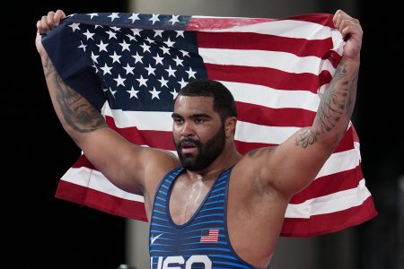 USA's Gable Dan Steveson celebrates winning the gold medal