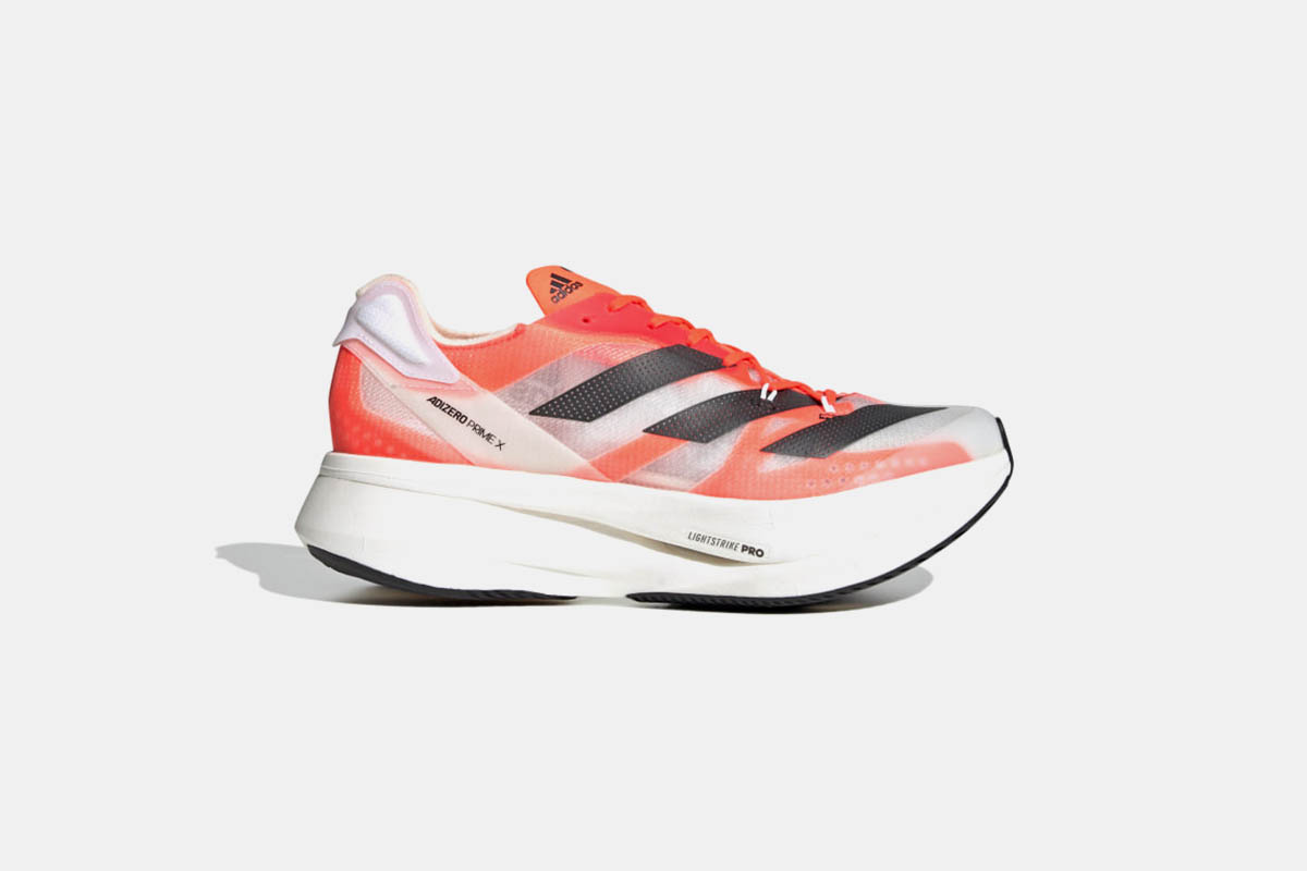 A pair of Adidas Adizero Prime X running shoes.