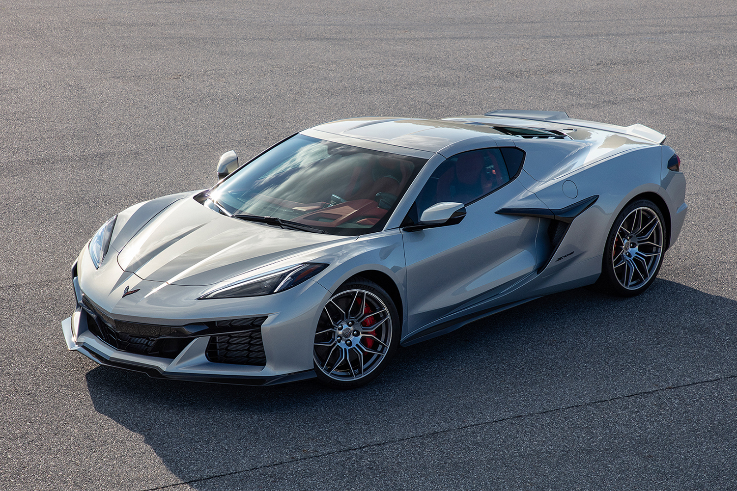 The 2023 Chevrolet Corvette Z06 in silver sitting on the tarmac. It's the first high-performance version of the new C8 Stingray.