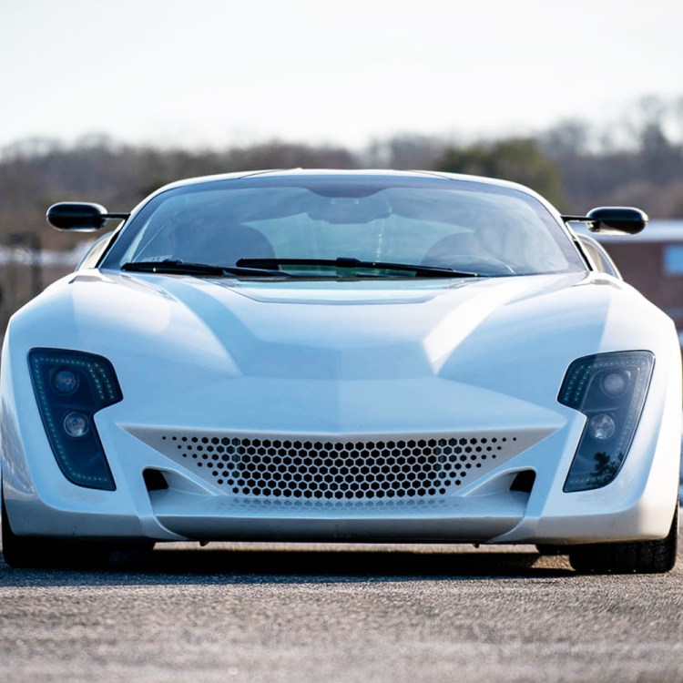 The front end of the Bertone Mantide, a supercar built from a Corvette C6, painted in white instead of the original red