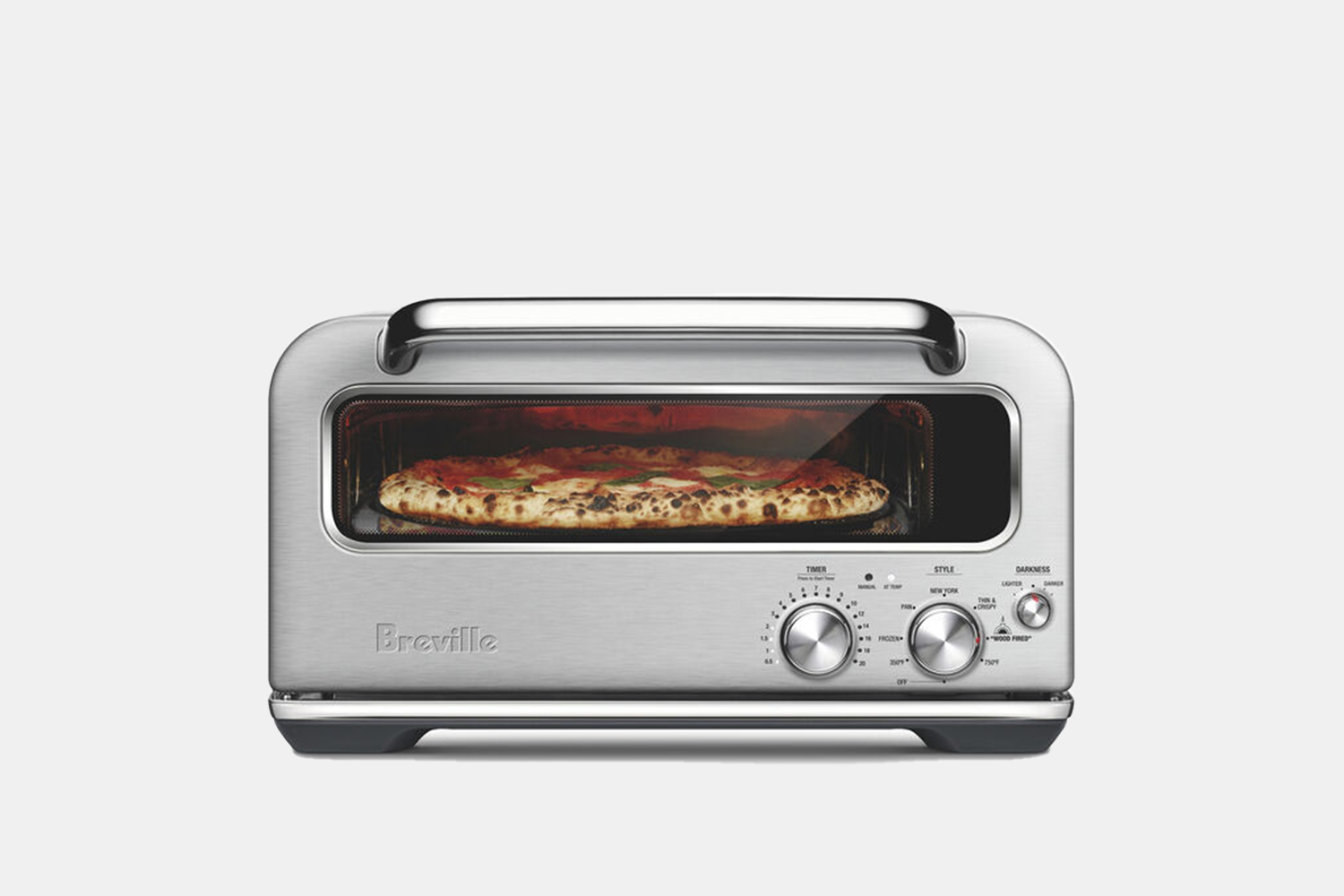 a small, rectangular oven with a pizza inside 