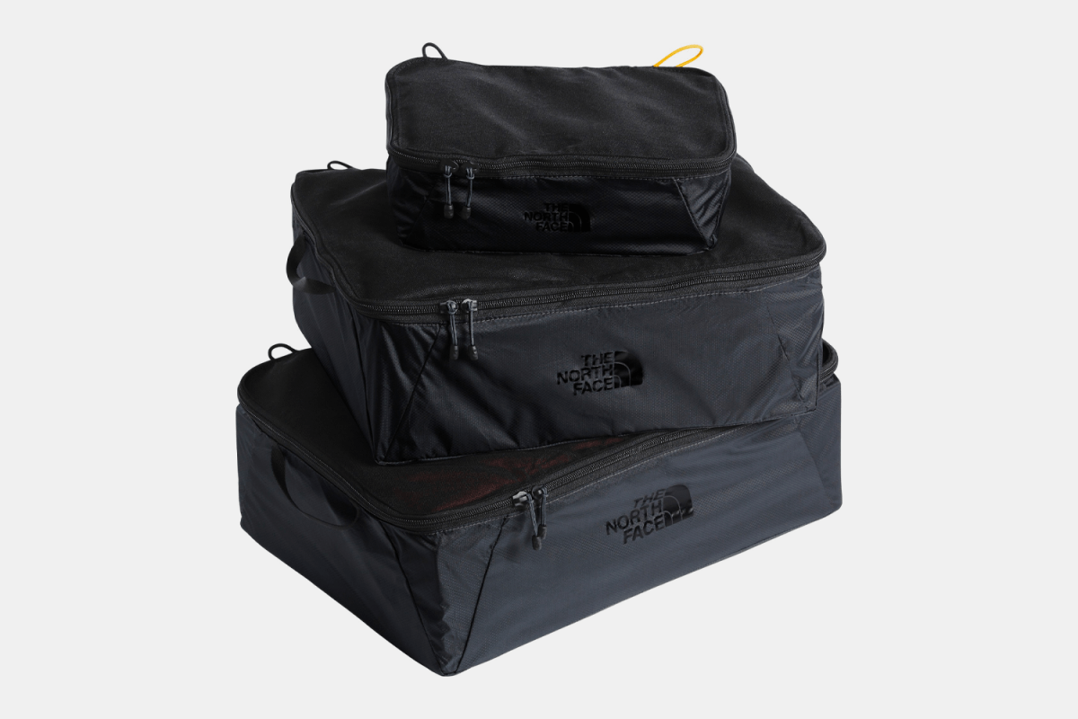 Close zoom The incredibly light Flyweight cube package includes small, medium and large Flyweight cubes that keep your clothes, gear and tech organized while you explore the globe. The North Face Flyweight Cube Package