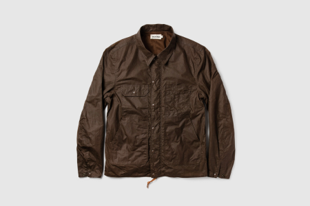The brown Longshore Jacket in Dark Oak Waxed Canvas from Taylor Stitch, though it's currently on sale at Bespoke Post