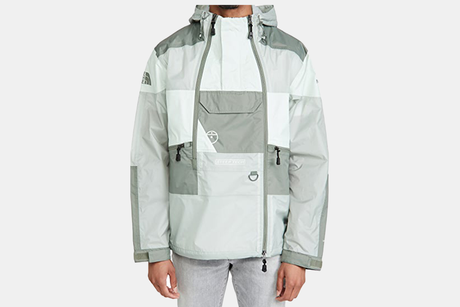 a grey patterned rain jacket.