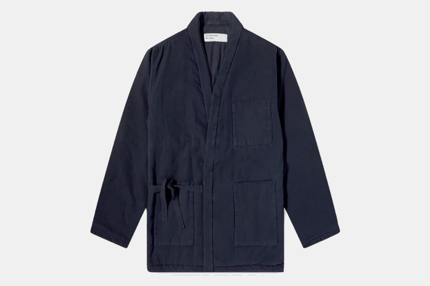a workwear jacket with a classic kimono tie In navy.