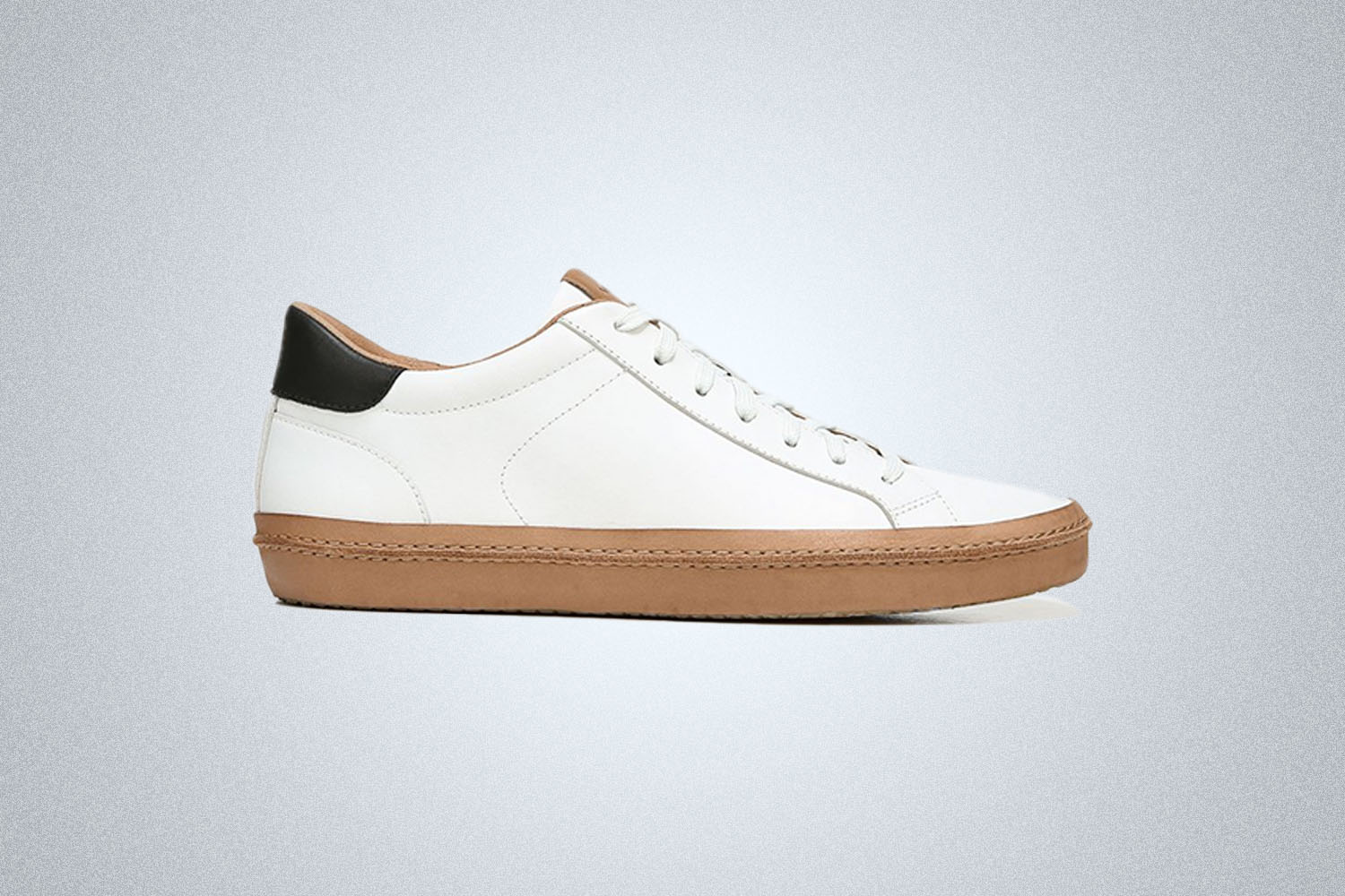 a office-ready sneaker on a grey background