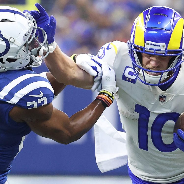 Cooper Kupp throws a stiff arm against the Indianapolis Colts