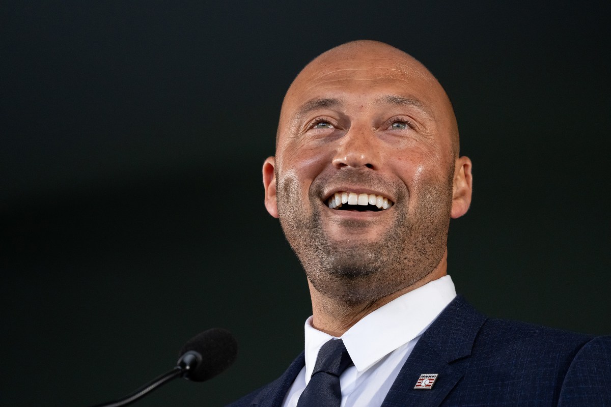 Derek Jeter smiles while delivering his remarks at the Baseball Hall of Fame Induction Ceremony at the Clark Sports Center on September 8, 2021 in Cooperstown, New York