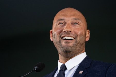 Derek Jeter smiles while delivering his remarks at the Baseball Hall of Fame Induction Ceremony at the Clark Sports Center on September 8, 2021 in Cooperstown, New York