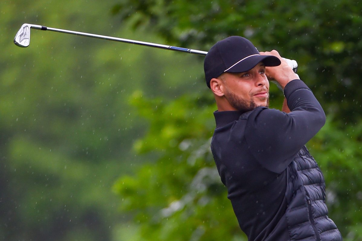 Steph Curry watches his tee shot at Muirfield Village Golf Club in Ohio