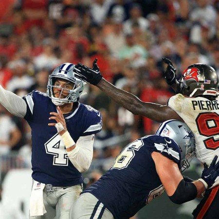 Dak Prescott #4 of the Dallas Cowboys passes while pressured by Jason Pierre-Paul #90 of the Tampa Bay Buccaneers during the third quarter at Raymond James Stadium on September 09, 2021 in Tampa, Florida. Prescott's impressive performance shouldn't be overshadowed by a last-second loss.