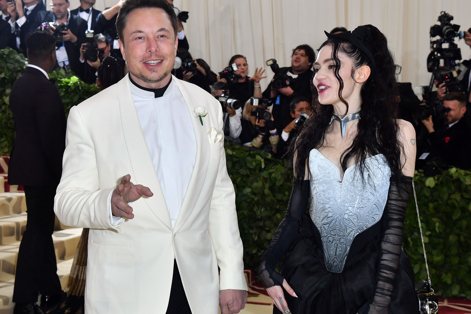 Elon Musk and Grimes at the 2018 Met Gala, where they made their public debut as a couple.