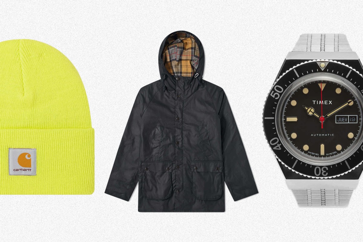 A neon yellow watch cap from Carhartt WIP, a Barbour Bedale waxed jacket with a hood and an M79 automatic watch from Timex, all on sale at End Clothing in September 2021