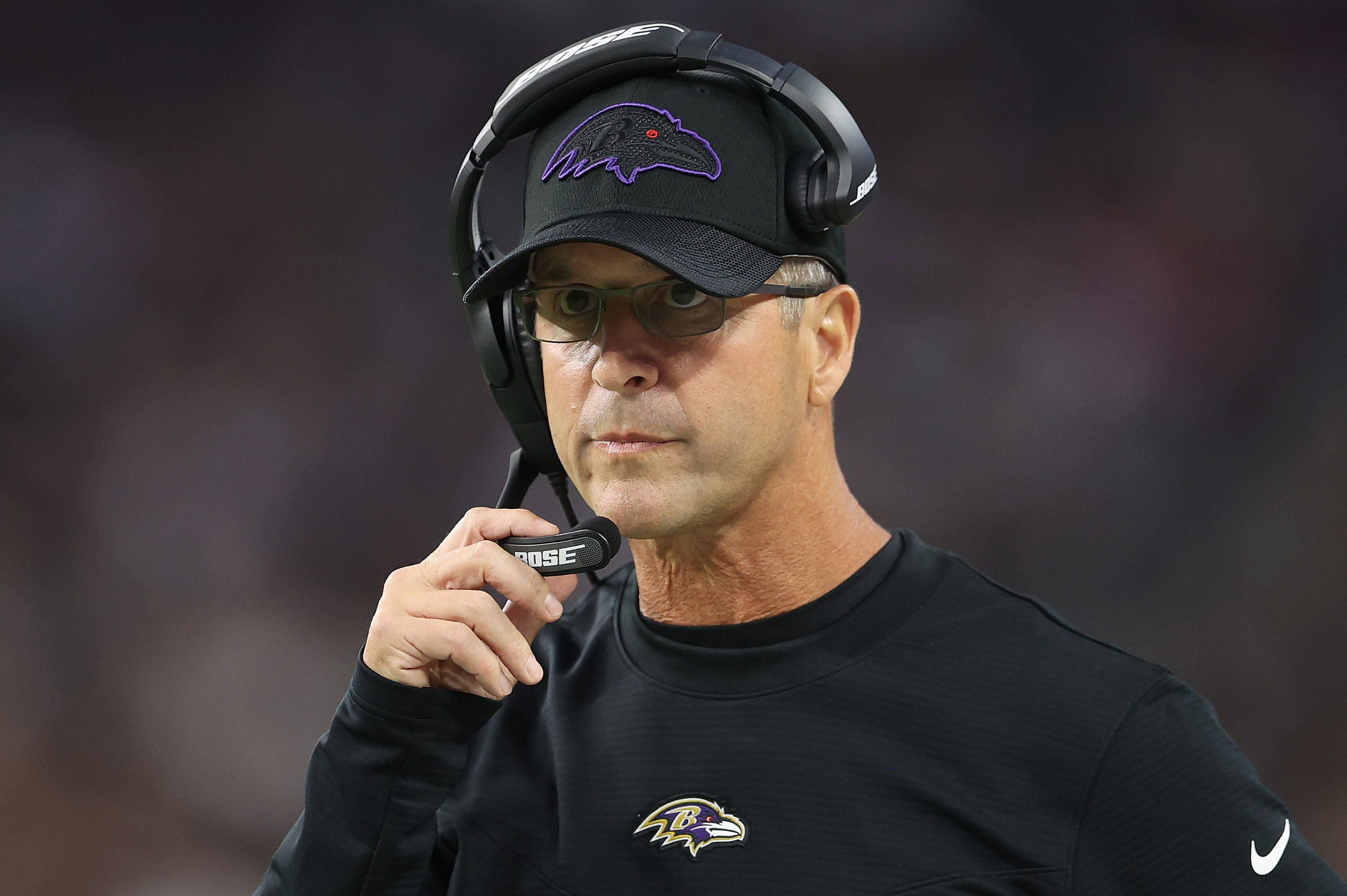 Head coach John Harbaugh of the Baltimore Ravens watches a game. Thanks to Harbaugh's fourth-down call, the Ravens finally beat the Chiefs.