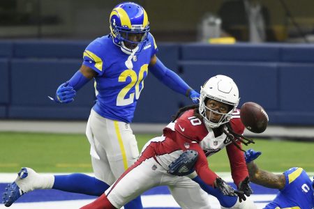 DeAndre Hopkins makes a reception while being defended by Jalen Ramsey at SoFi Stadium